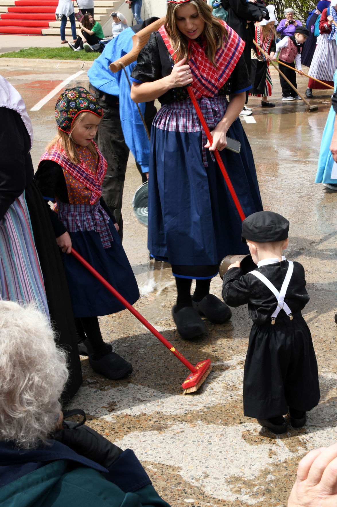 236 All ages help clean the streets.JPG